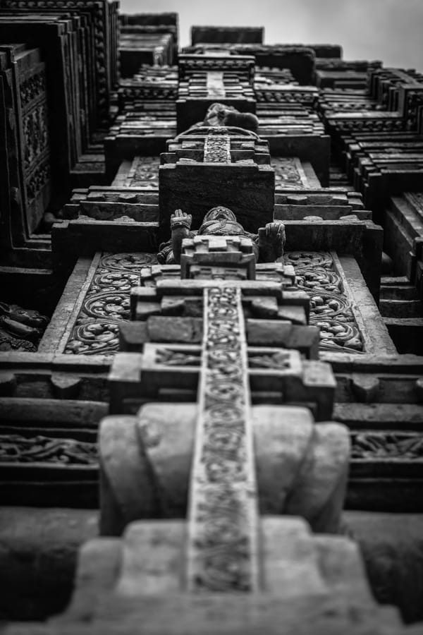 Carved in Stone. Sandstone carvings for the peak of the Jagannath Temple, Banjara Hills — the work of some sixty stone carvers, receding into shallow focus.