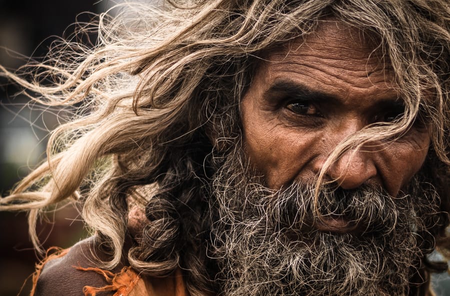 Intense. A beggar on a Hyderabad street one evening — light through his white hair, the look of a wise old sage. He turned, caught me aiming the camera, and held still for a few startled seconds: all his anguish frozen in one frame. A reminder that even beggars carry whole stories behind their eyes.